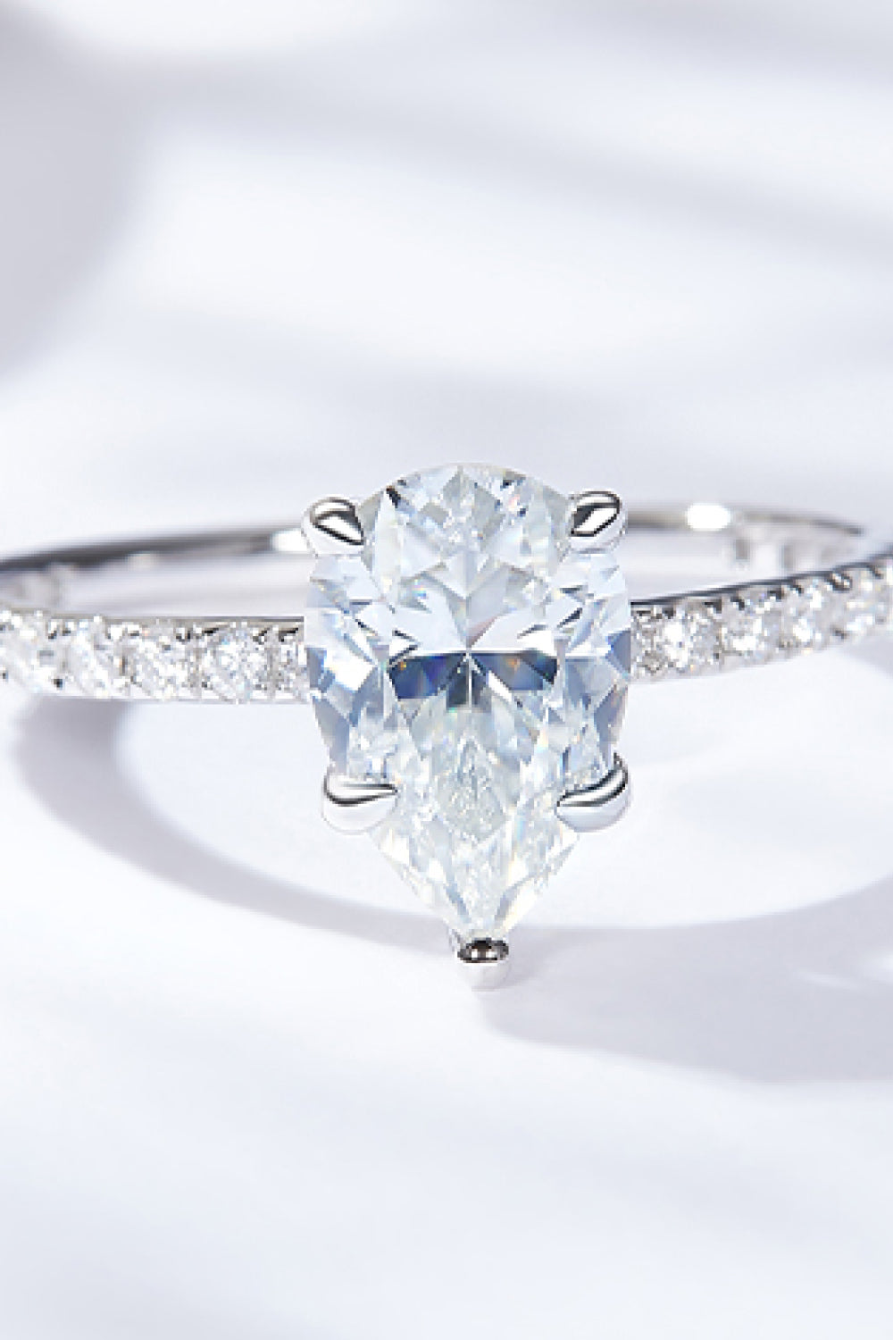 1.8 Carat Moissanite Pear Side Stone Ring