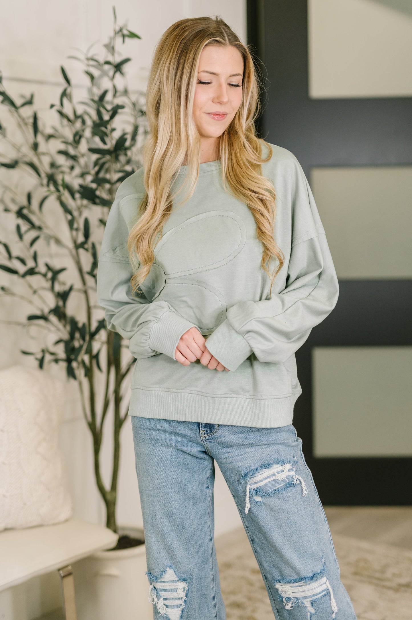 Petal Poise Floral Applique Pullover in Ivy