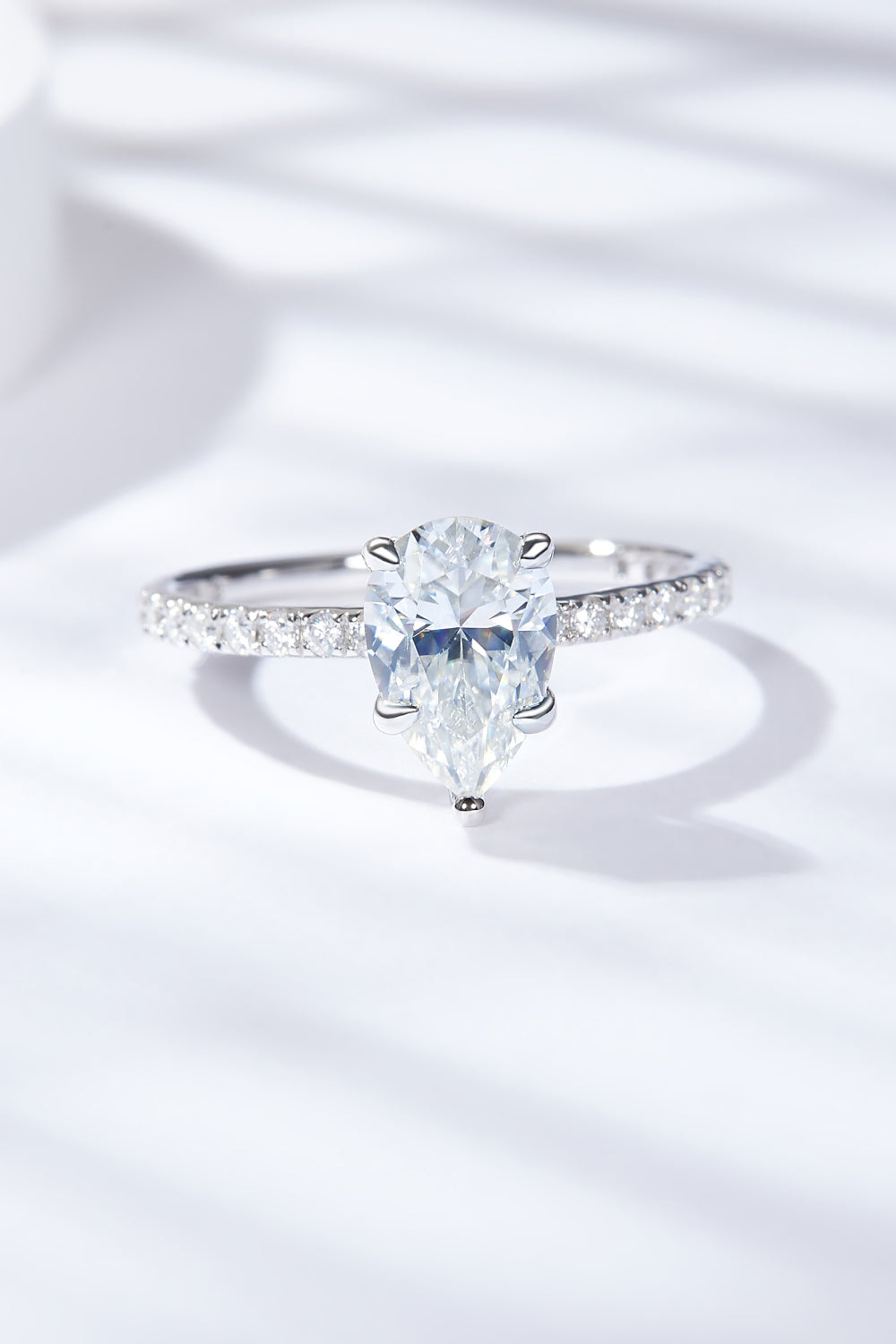 1.8 Carat Moissanite Pear Side Stone Ring